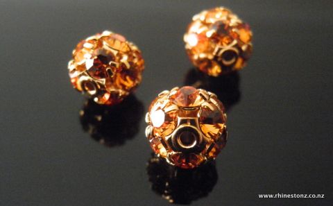 Swarovski Diamante Bead Topaz/Gold 8mm